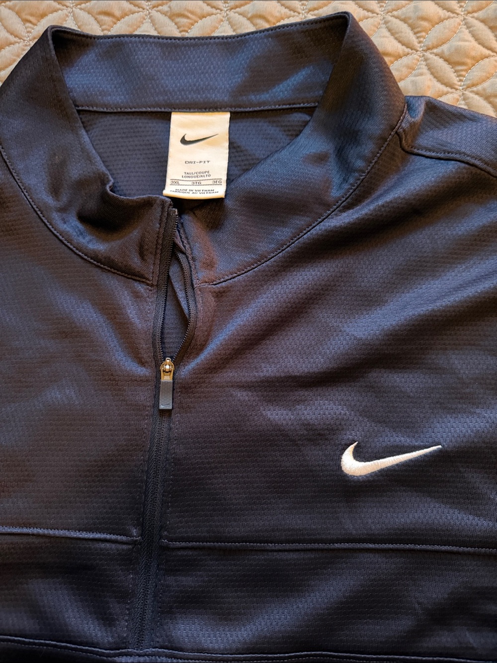 Nike Black Half-Zip Performance Pullover with White Swoosh